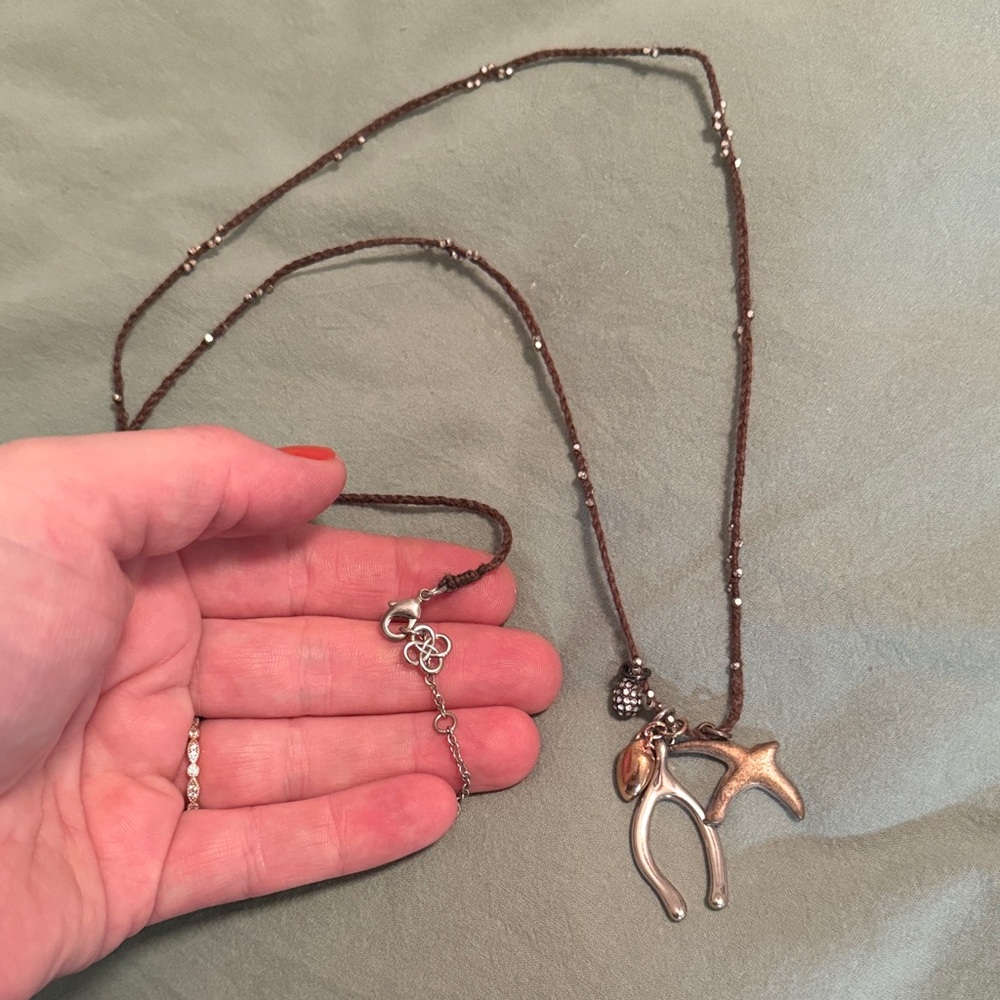 Brown wishbone Necklace with Silver and Gold Charms